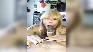 Black beauty carefully sucks a guy’s cock through a condom in POV style