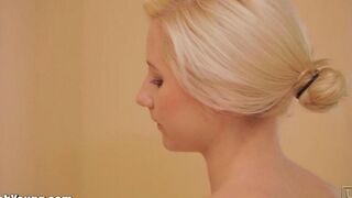 Girl plays with a brush and cum in the bathroom