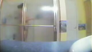 A girl has no idea there’s a camera in the shower
