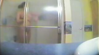 A girl has no idea there’s a camera in the shower