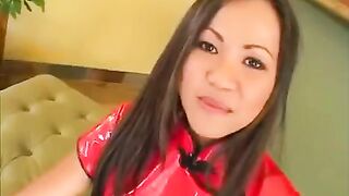 The pretty Korean woman does a blowjob with two guys