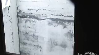 A pervert with a camera shoots girls peeing in the toilet