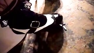 A woman masturbates her sweet pussy in the toilet