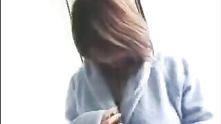 A fat Korean virgin with big tits gets her boobs played with