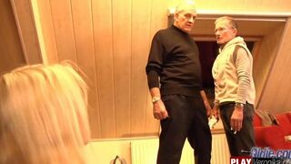 A young blonde has sex with a man with a gray beard