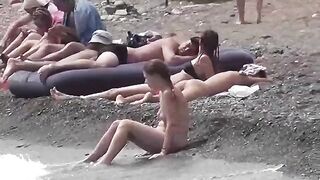A little naked fun on the beach with a couple