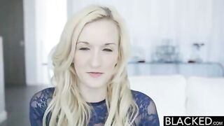 The blonde is fucking a black guy while playing with a vibrator
