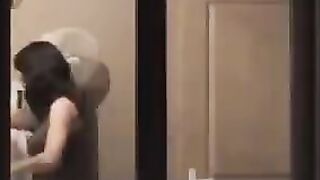 The guy admires himself in the mirror, not leaving anything to chance