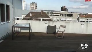 A hot brunette with big tits has sex straight on the roof in POV style