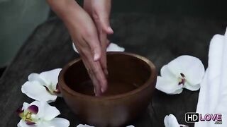 A girl received an erotic massage from her friend in the bedroom