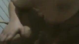 A fat woman dances naked in front of her husband, who is very excited