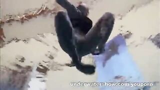 A erotic scene of a naked girl in the swimming pool