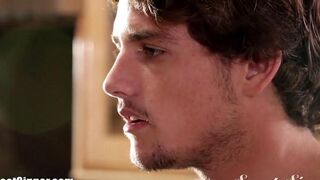 A cute brunette makes a deep blowjob straight from the bed