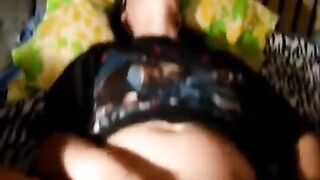 A cute minor girl caresses her slim pussy on camera