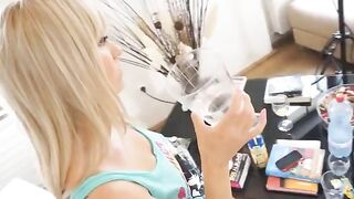 The blonde teen has big tits and gets drunk, see her
