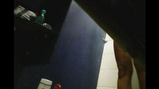 A hidden camera in the shower captures a girl's shaved intimate moments