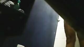 A hidden camera in the shower captures a girl's shaved intimate moments
