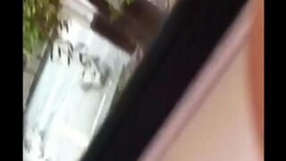 The guy masturbates his big cock right on the street