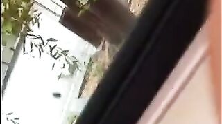 The guy masturbates his big cock right on the street