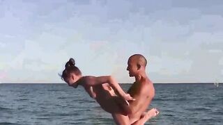 Nudist beauties demonstrate their skills in acrobatics on the naked beach