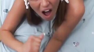 A hot blondie with glasses gets her brains fucked on the bed