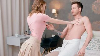 A girl is having a conversation with her lover naked on the bed