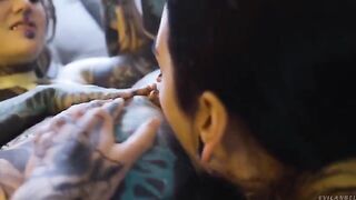 A cute lesbian couple has fun with a strapon dildo, diving into passionate anal play