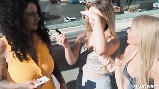 A hot chick is having fun with girls on the strip