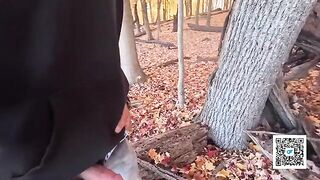 A married couple enjoys a passionate outdoor encounter in the park