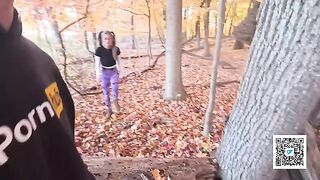 A married couple enjoys a passionate outdoor encounter in the park