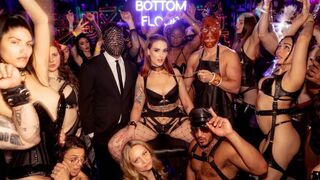 Sex on the swing set in a club setting
