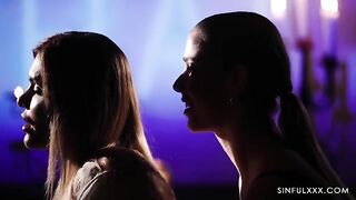 Romantic sex of a man with two girls in an intimate setting
