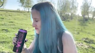 A girl is having fun with her classmate in the forest
