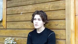 A joint was smoked by a flower crown wearing Russian brunette
