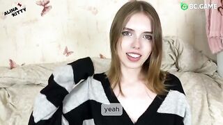 An almost naked girl is teasing her friend in the kitchen, driving him wild