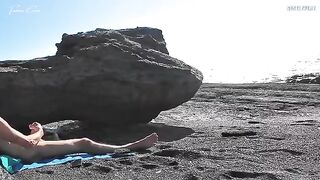 A girl has removed her swimming suit on the barefoot beach