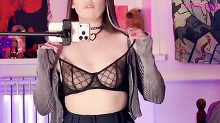A sexy girl in stockings took a big toy and caressed it with her legs