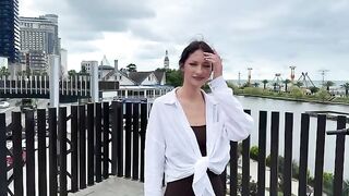 A signal of distress from a stunning young woman wearing a bikini