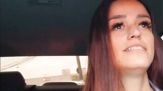 A hot chick is getting fucked in the car on the public road