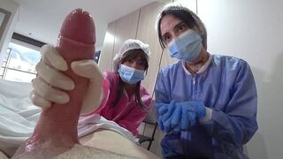 A man was checked by two hot nurses in the hospital
