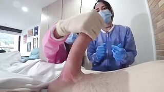 A man was checked by two hot nurses in the hospital