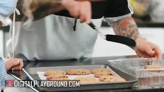 A hot blonde teen, Khloe Kapri, bakes cookies in a sexy apron
